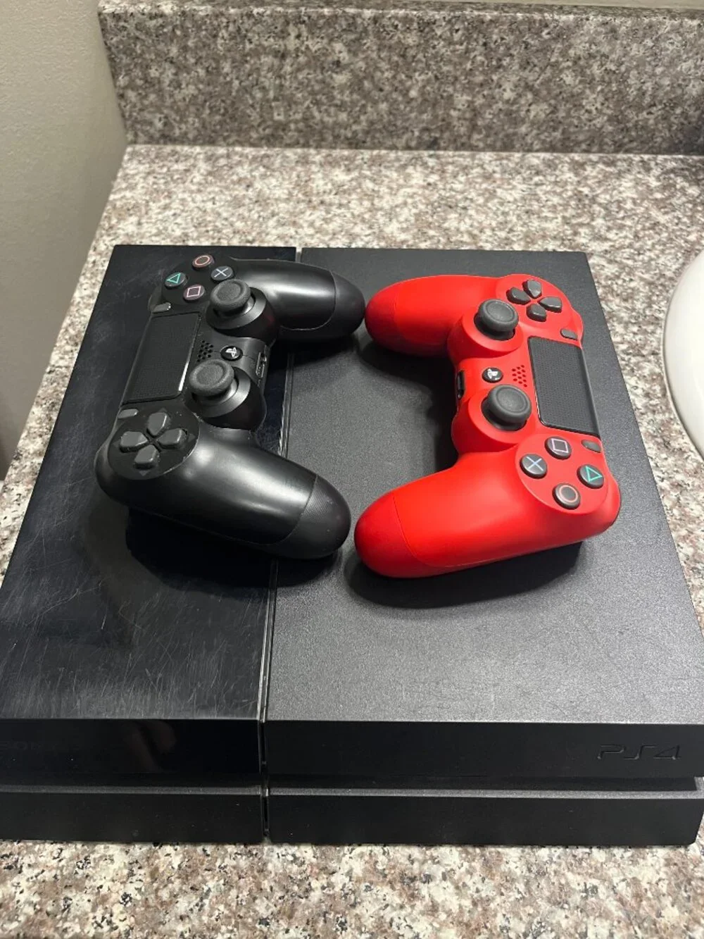 PS4 500 GB with 2 controllers and assorted games